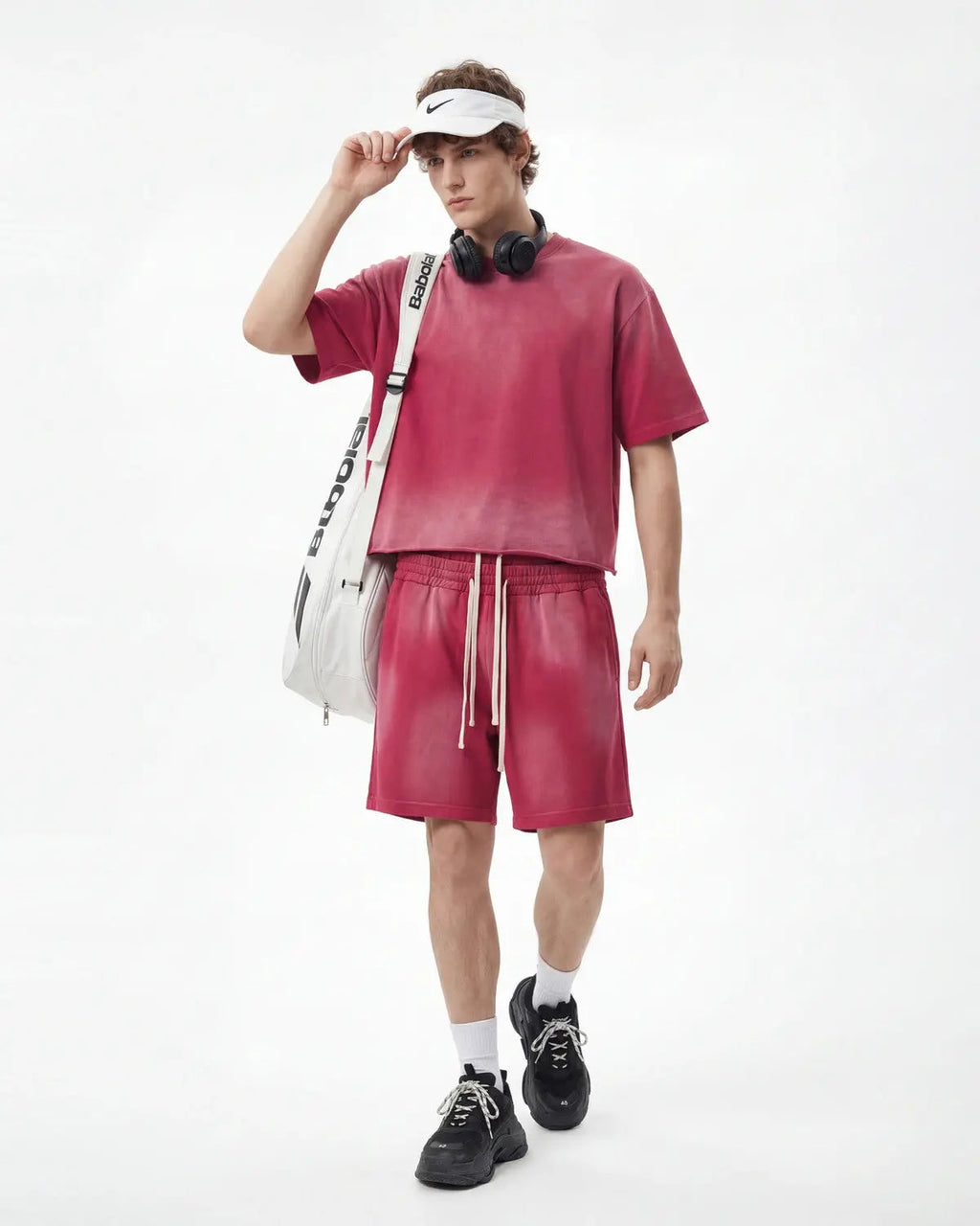 Monkey Washed Boxy Cropped T-Shirt by INFLATION, featuring a relaxed fit and washed fabric, displayed on a hanger.