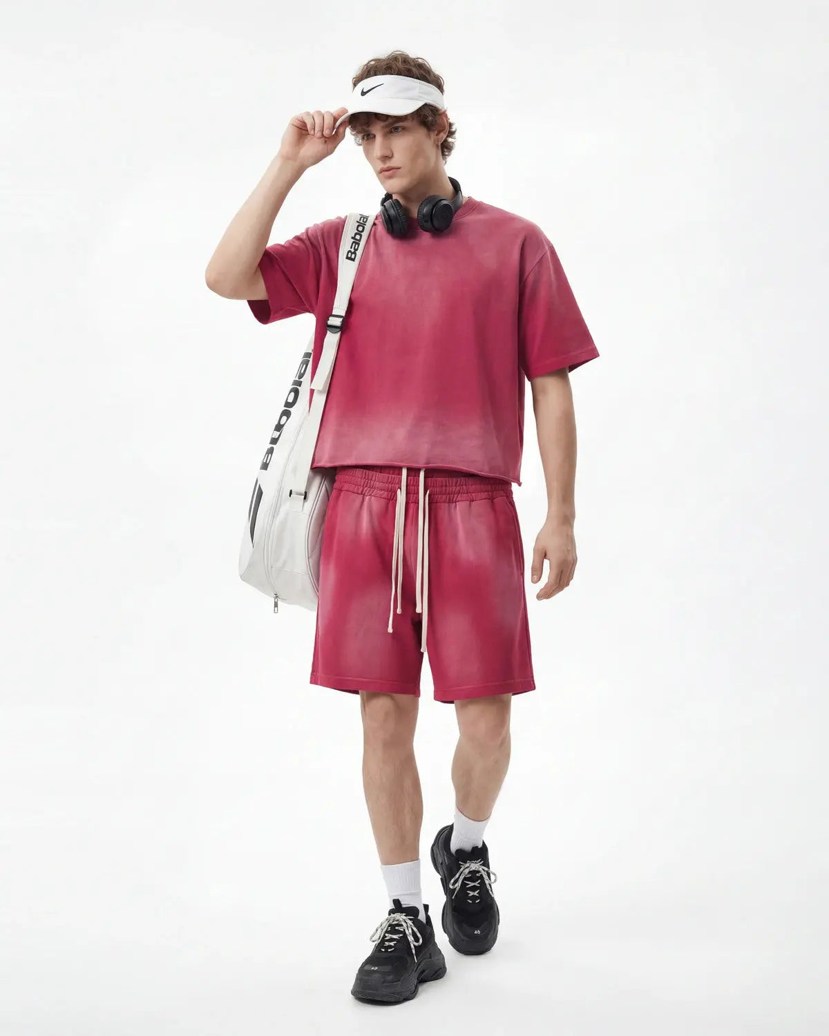 Monkey Washed Boxy Cropped T-Shirt by INFLATION, featuring a relaxed fit and washed fabric, displayed on a hanger.