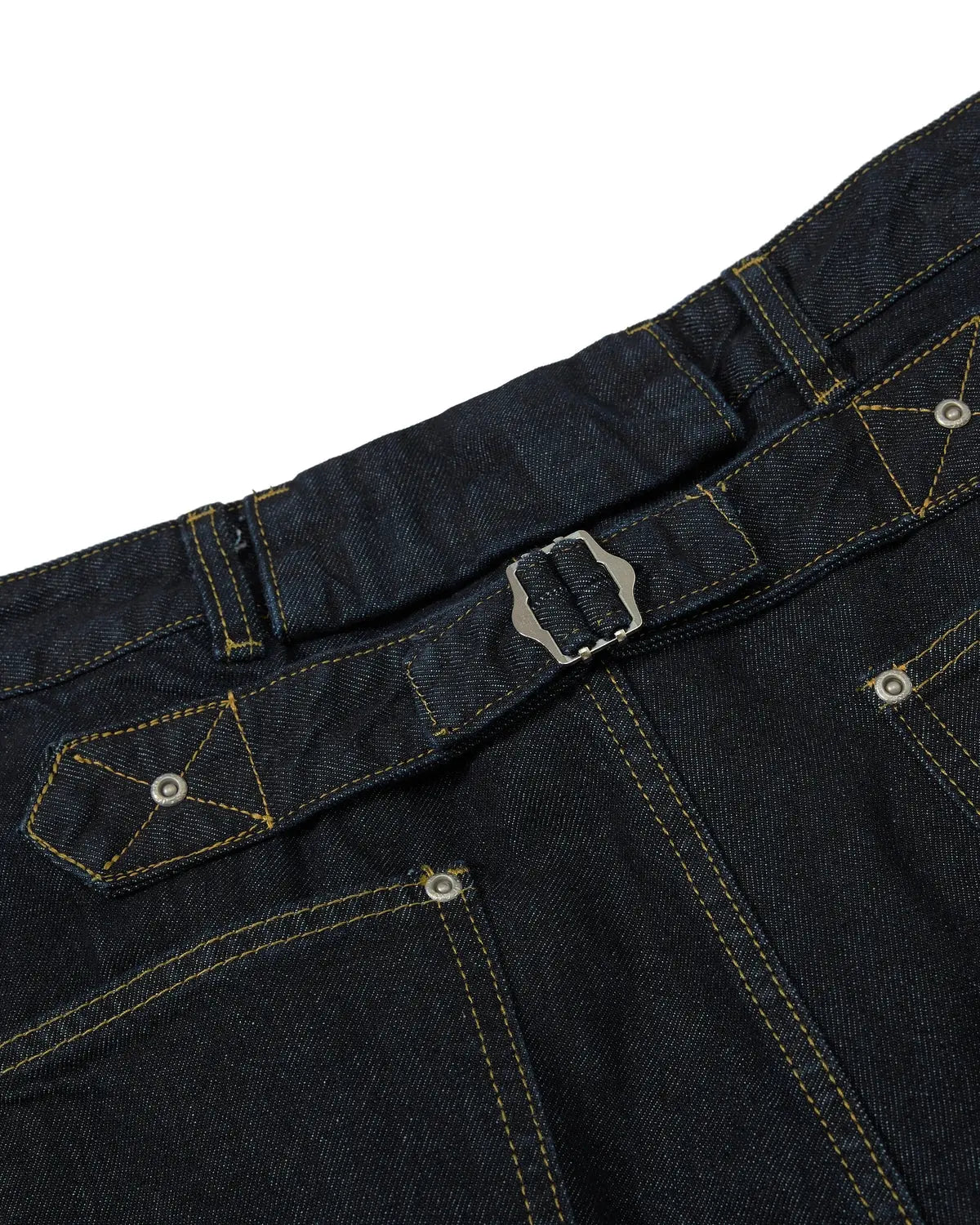 Deconstructed wide-leg longline jorts by INFLATION, featuring distressed denim and a relaxed fit with frayed hems.