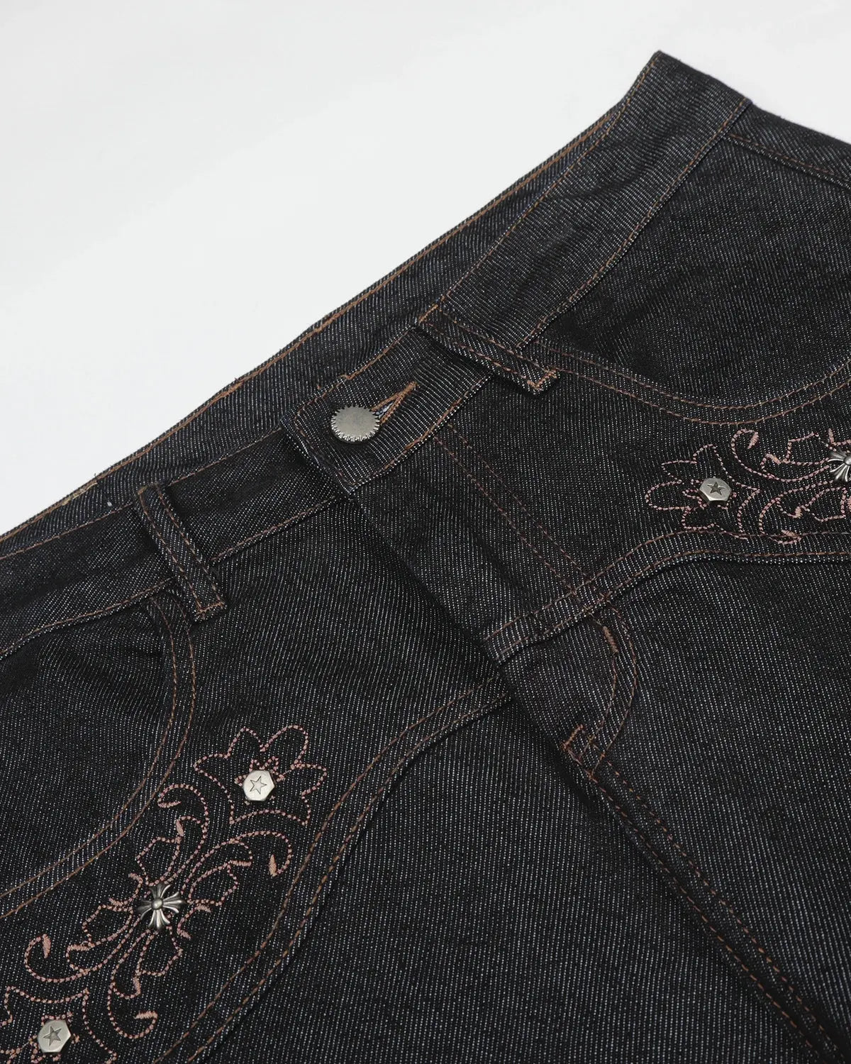 Vintage embroidered bootcut jeans by INFLATION featuring detailed embroidery and classic denim style.