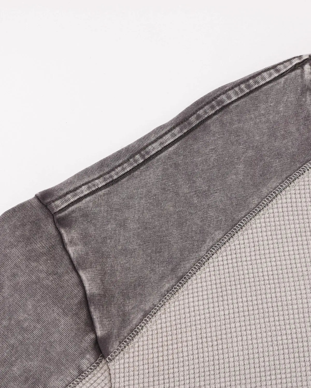Textured patchwork washed T-shirt by INFLATION, featuring a stylish streetwear design with a mix of fabric textures and colors.