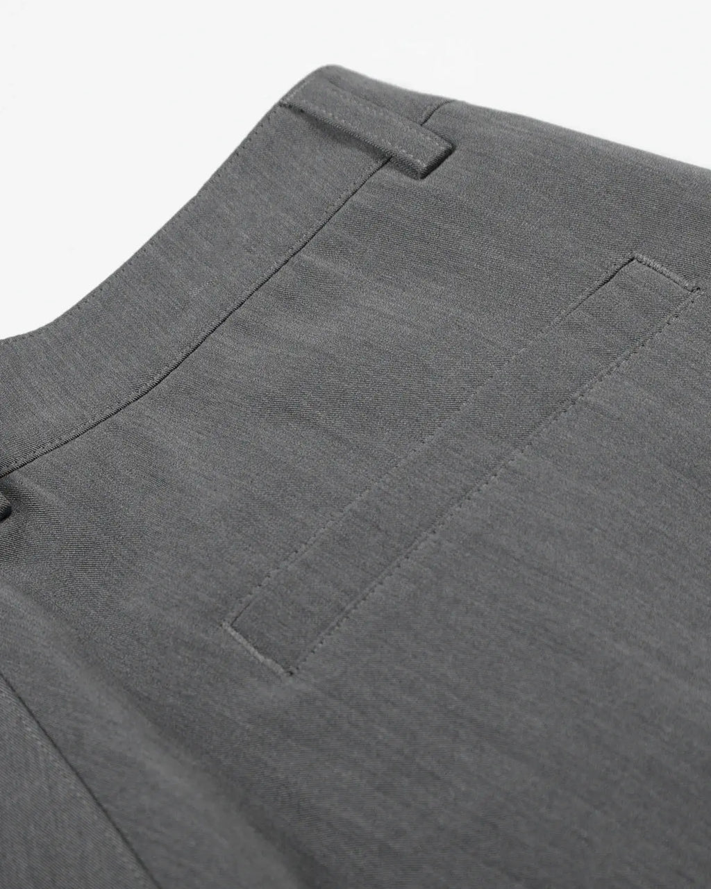 Inflation Streetwear pleated stud detail tailored shorts, stylish pants with unique embellishments and a modern fit.