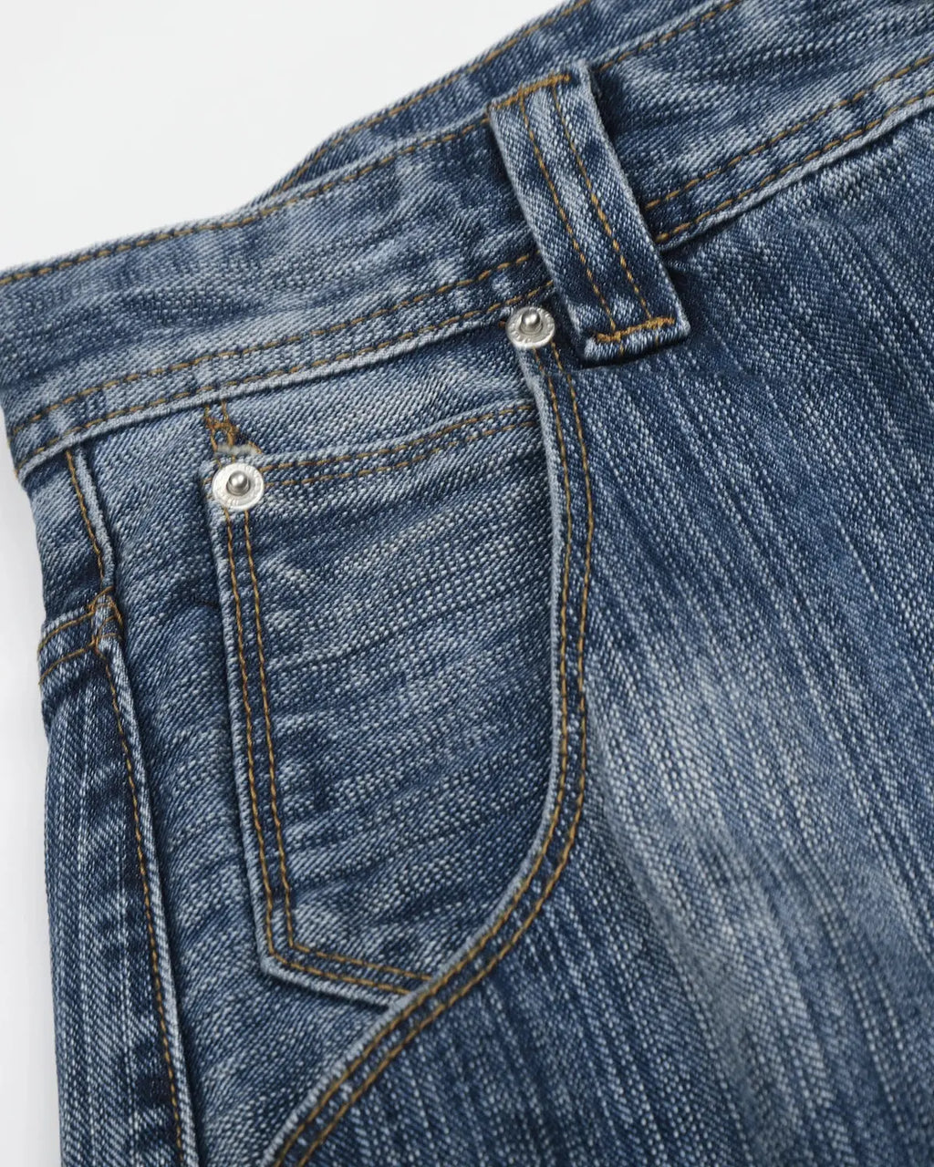 Adjustable waist bamboo weave baggy jeans by INFLATION featuring relaxed fit and streetwear style, shown on a model.