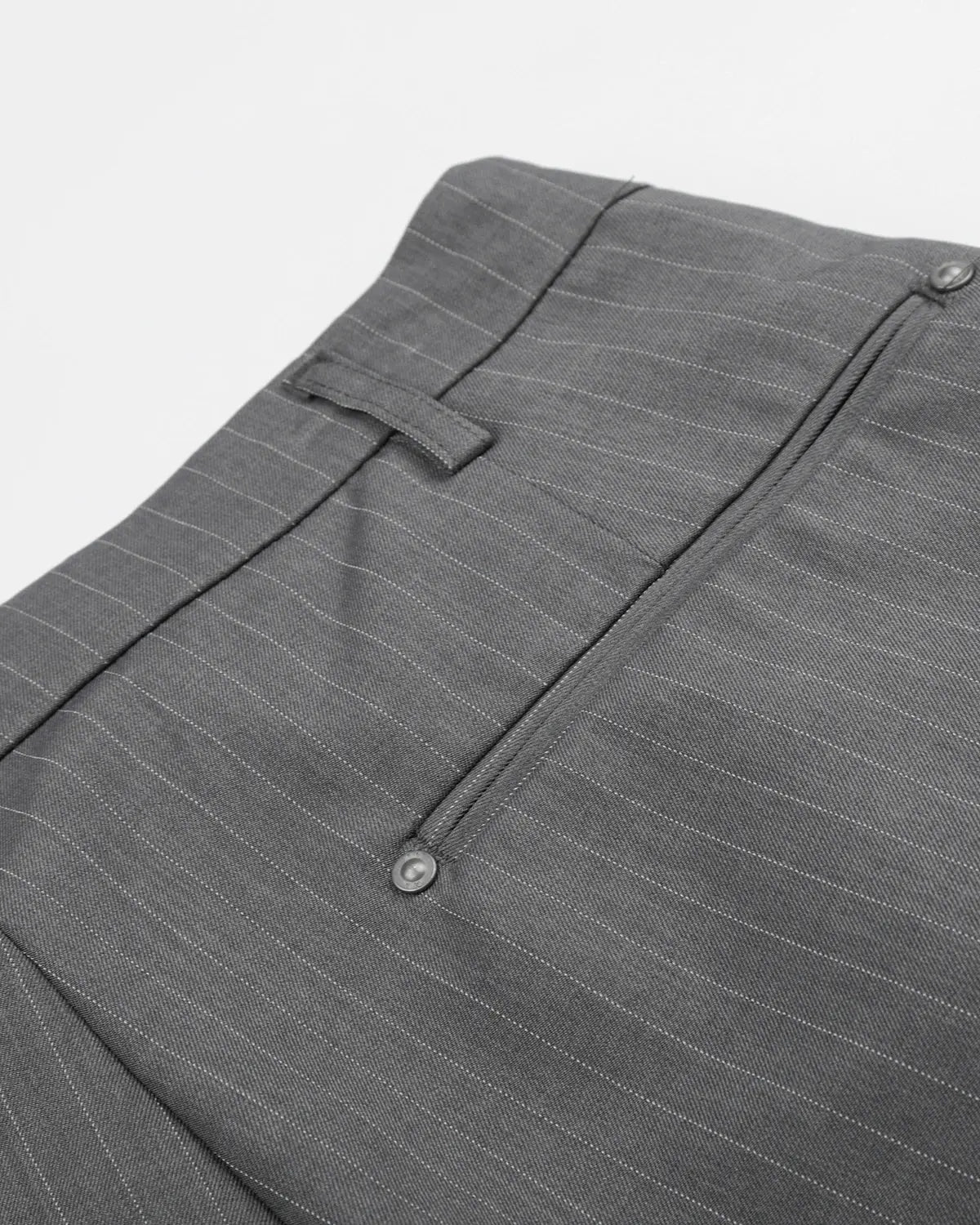Inflation Streetwear pinstripe pleated shorts with ring detail, tailored design, and stylish fit, perfect for modern street fashion.