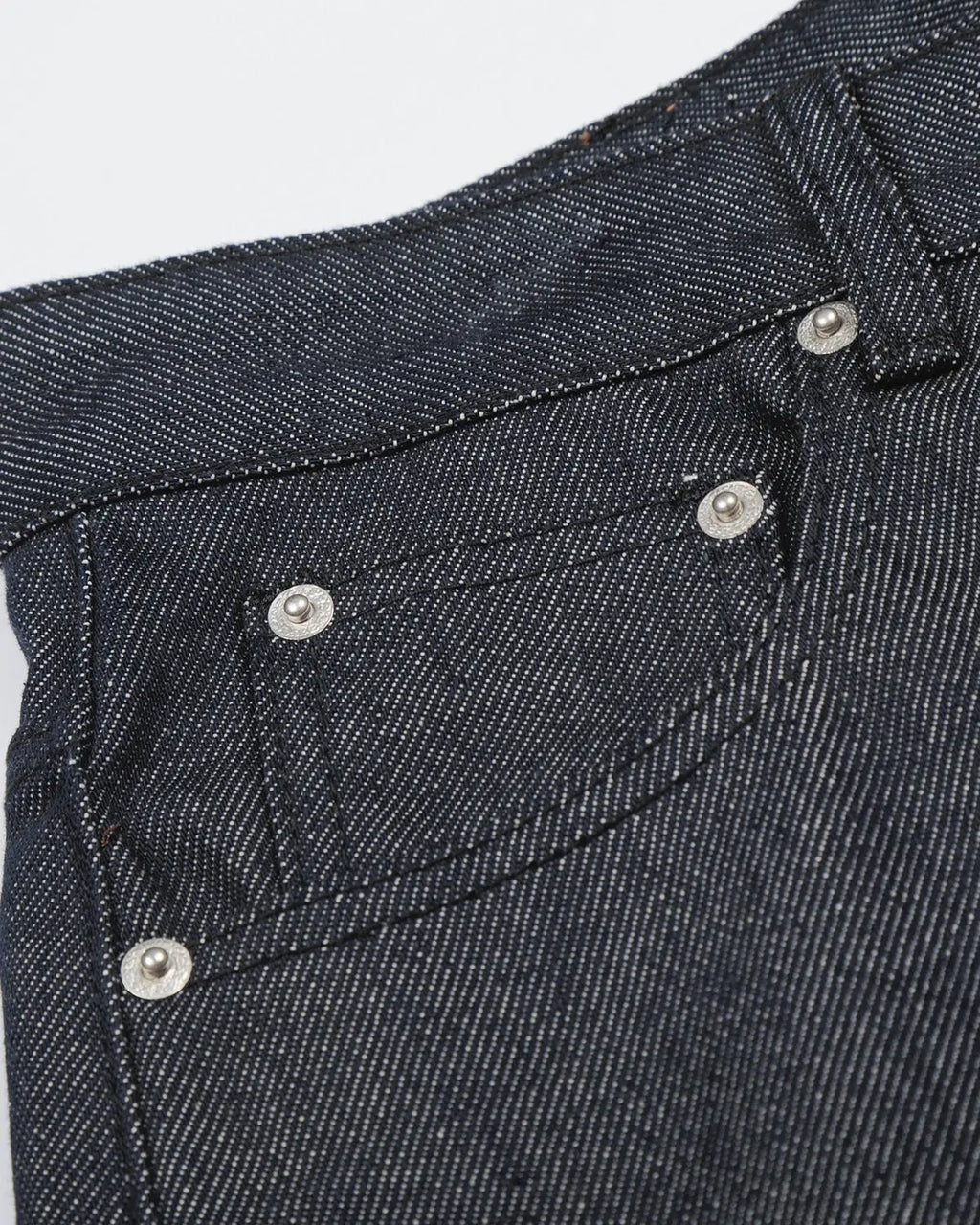 Inflation Button Detail Baggy Denim Jorts showing distressed denim fabric with button accents and relaxed fit.