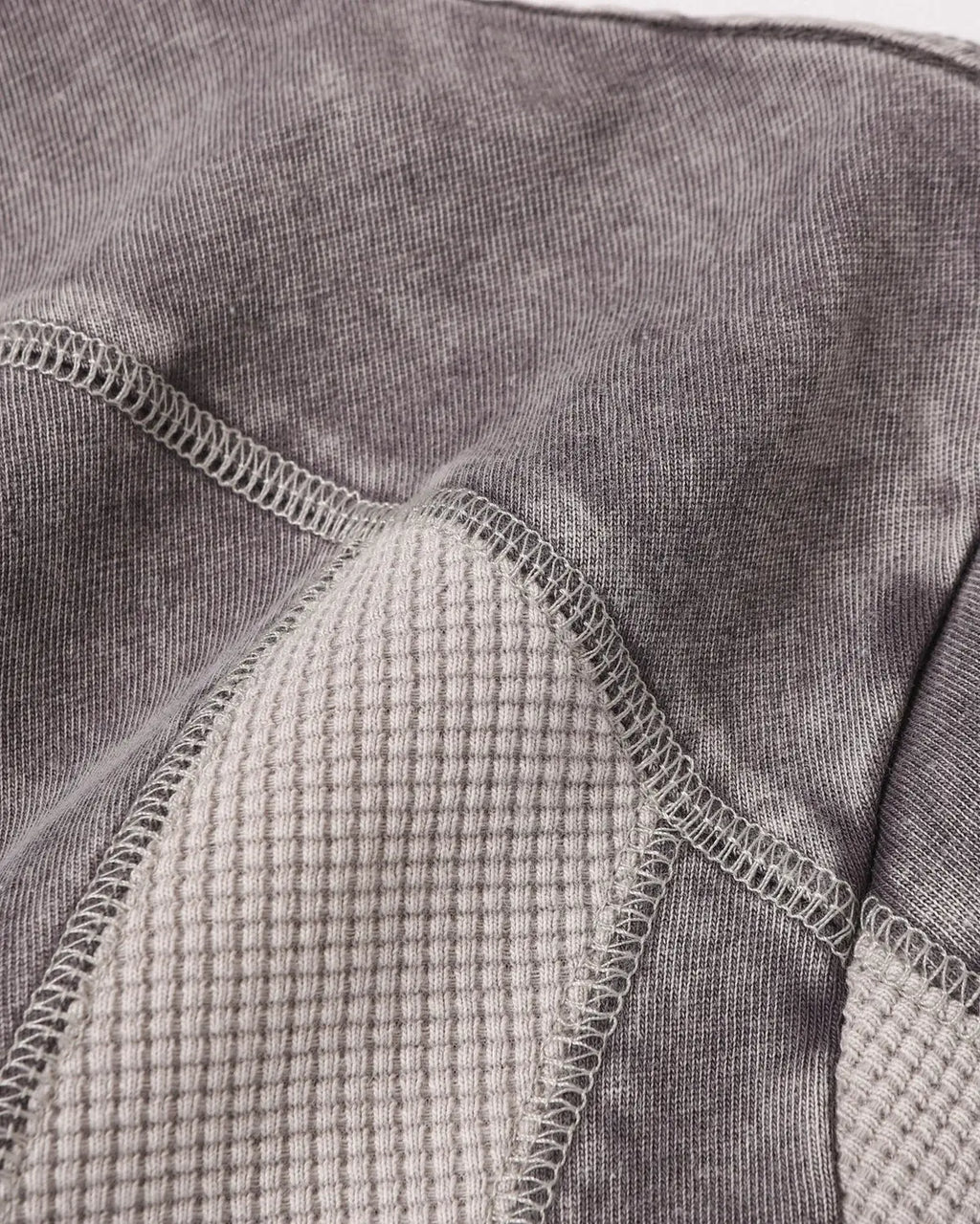 Textured patchwork washed T-shirt by Inflation Streetwear featuring a casual, stylish design with mixed fabric patterns.
