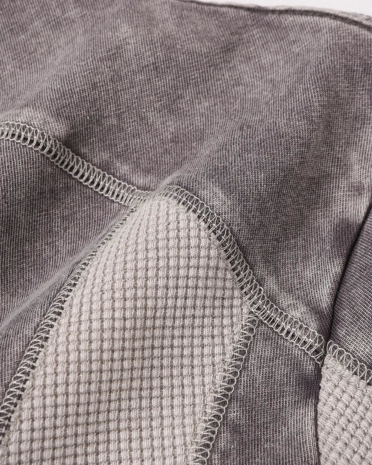 Textured patchwork washed T-shirt by Inflation Streetwear featuring a casual, stylish design with mixed fabric patterns.