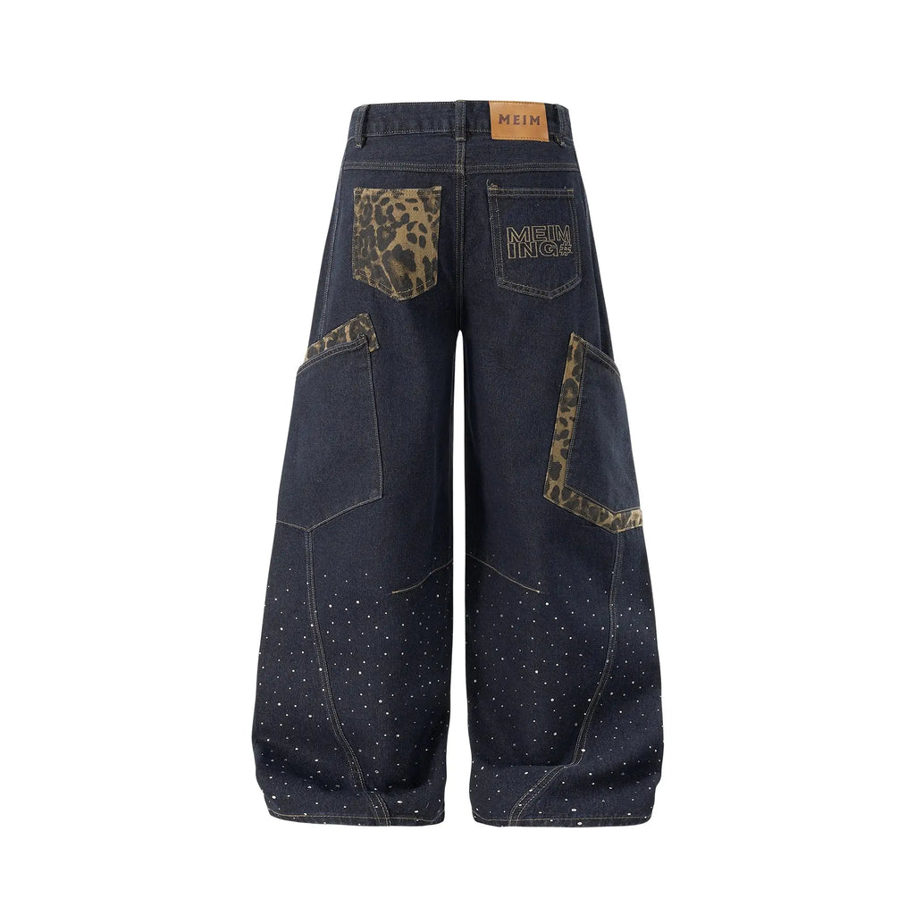 Leopard patch rhinestone barrel jeans by INFLATION featuring bold animal print and sparkling rhinestone accents for streetwear style.