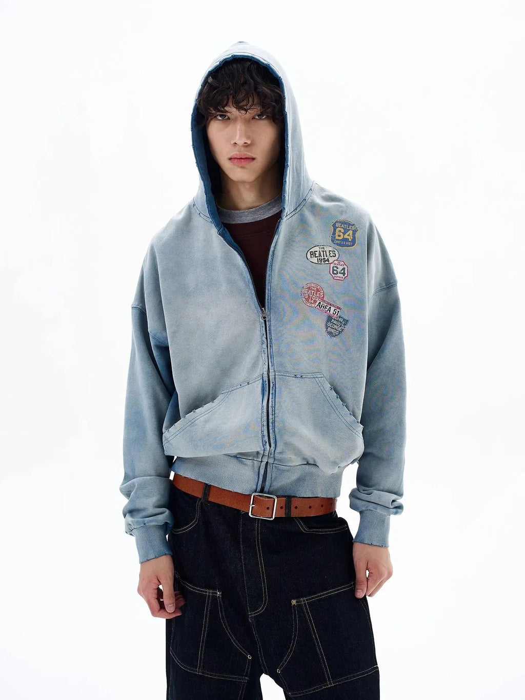 Blue distressed acid wash zip-up hoodie by INFLATION Streetwear, showcasing a casual fit with a drawstring hood and front zipper detailing.