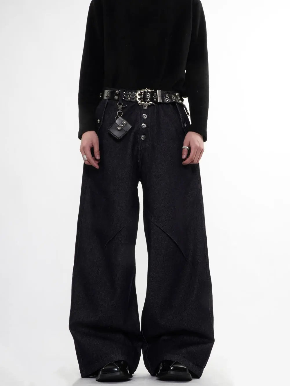 Inflation Buttons Up Raw Blue Baggy Jeans showing relaxed fit, button details, and raw denim texture on a casual streetwear style.