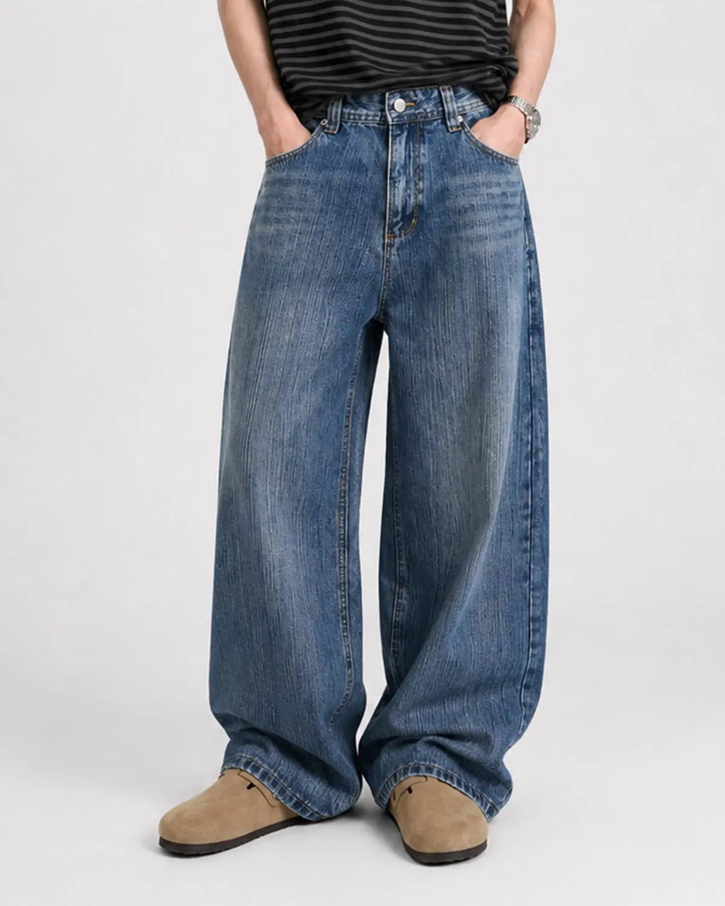 Adjustable waist bamboo weave baggy jeans by INFLATION featuring relaxed fit and streetwear style in denim fabric.