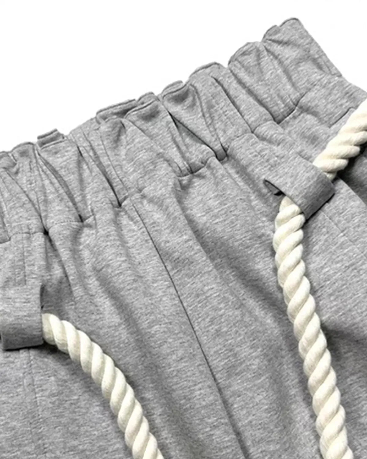 Inflation Super Baggy Barrel Sweatpants in black, featuring a loose fit and tapered legs, streetwear style with brand logo detail.