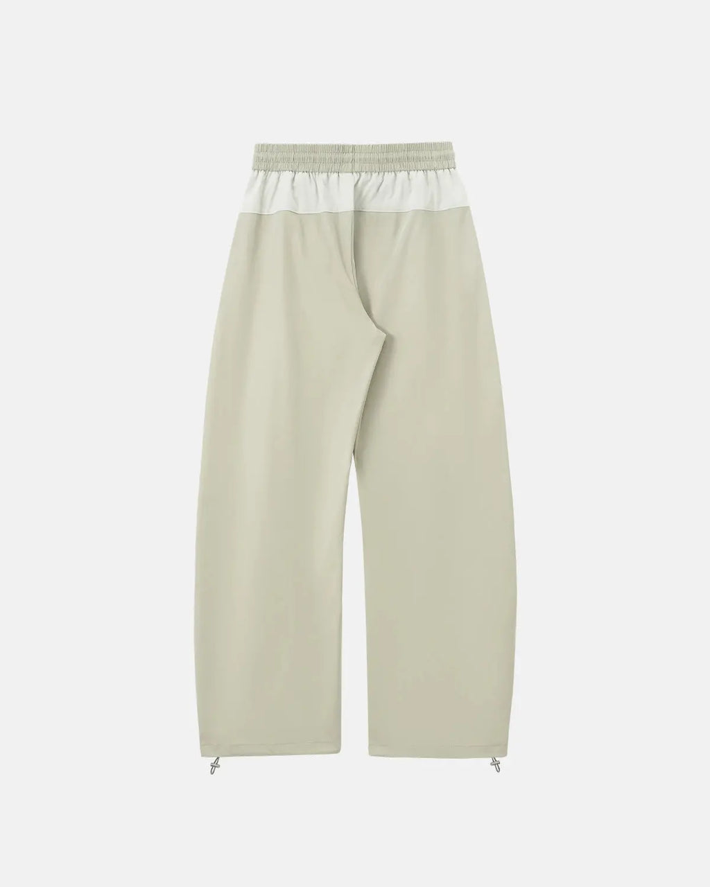 Reflective windbreaker track pants by INFLATION with sleek design, reflective details, and athletic fit for streetwear style.