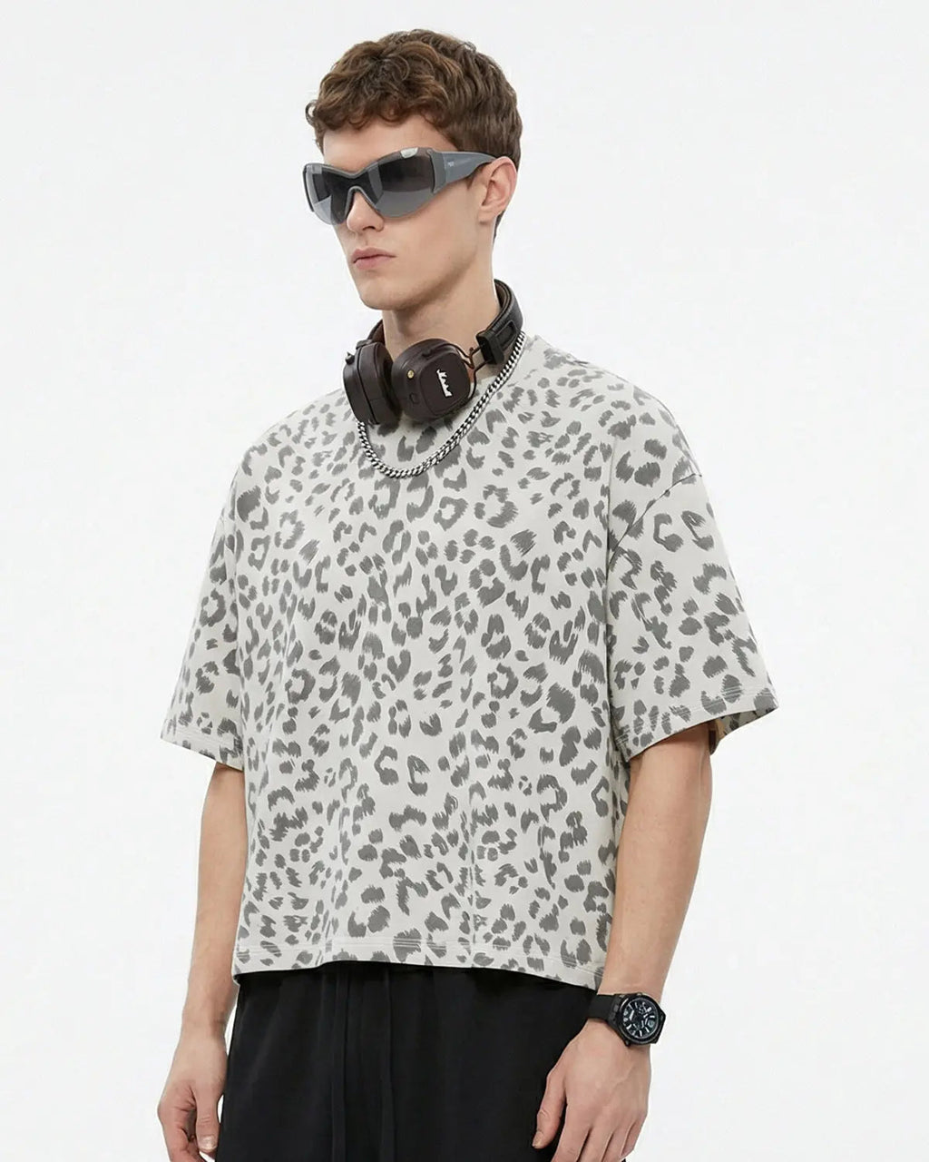 Leopard print boxy T-shirt by INFLATION with short sleeves and relaxed fit, featuring bold animal pattern design.
