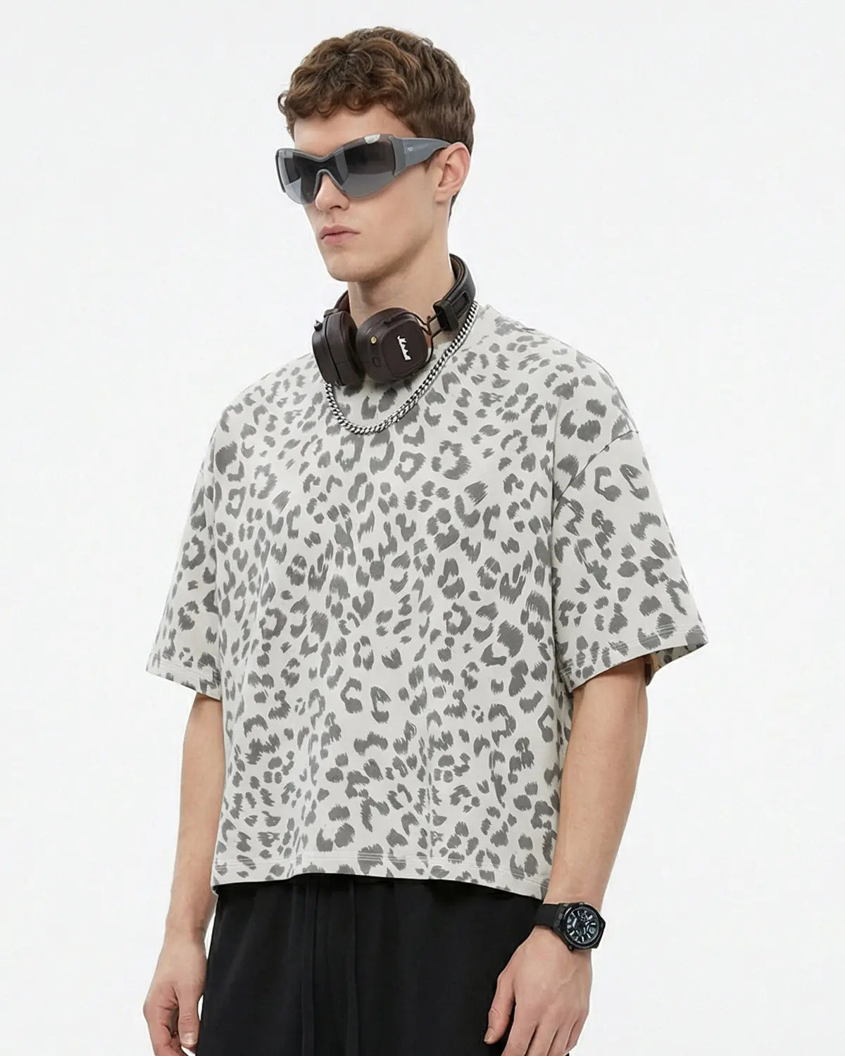 Leopard print boxy T-shirt by INFLATION with short sleeves and relaxed fit, featuring bold animal pattern design.