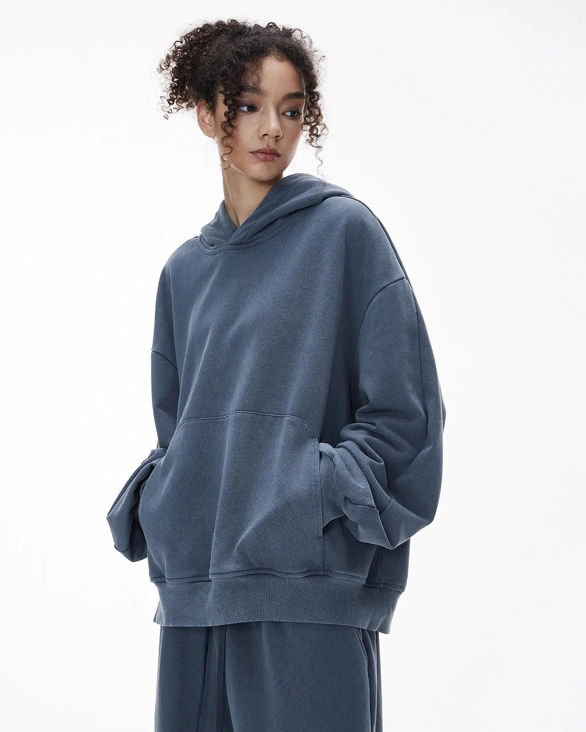 Inflation streetwear garment washed French Terry hoodie featuring a relaxed fit and soft fabric with a drawstring hood.