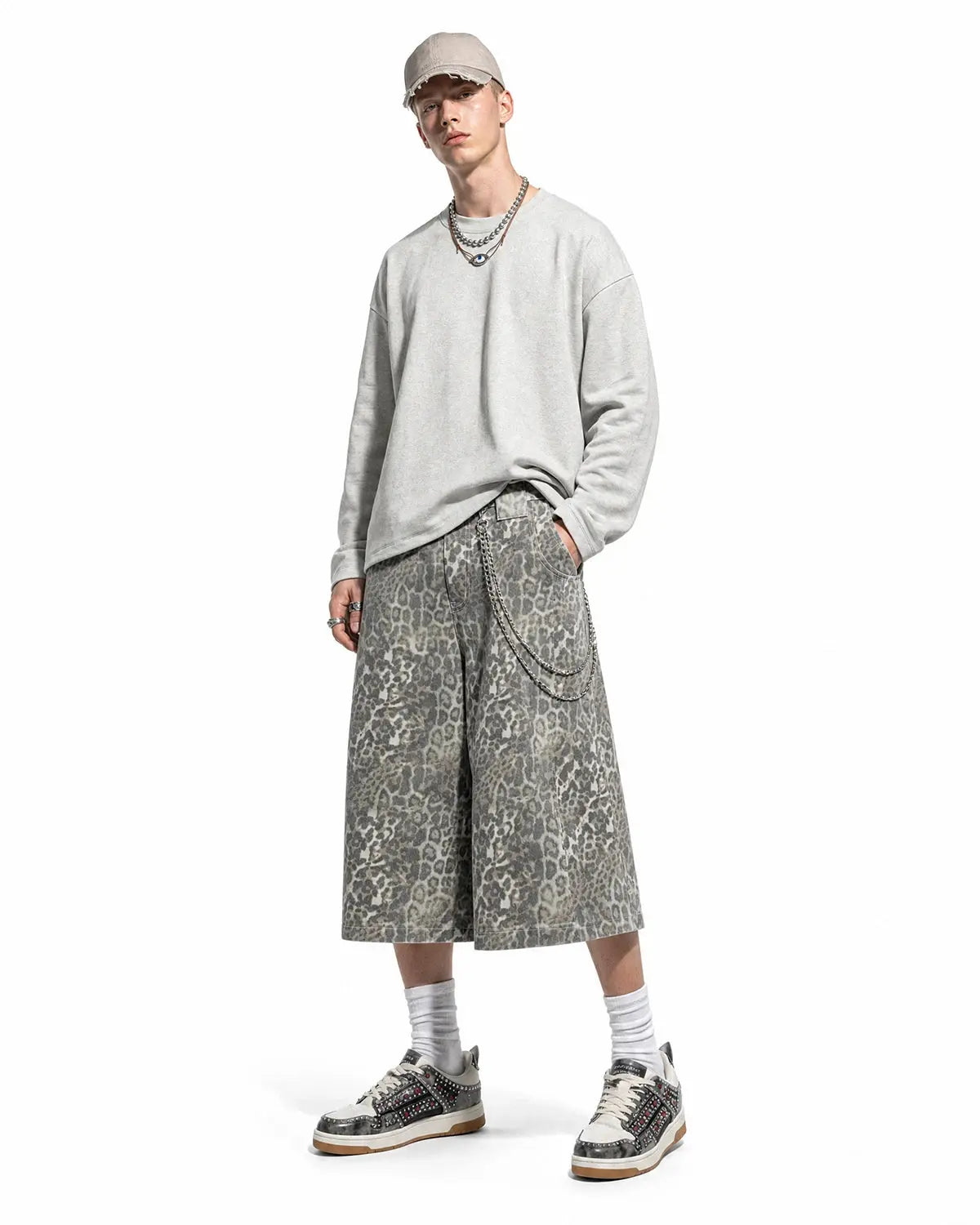 Leopard print baggy shorts by INFLATION, casual streetwear pants with a loose fit and bold animal print design.