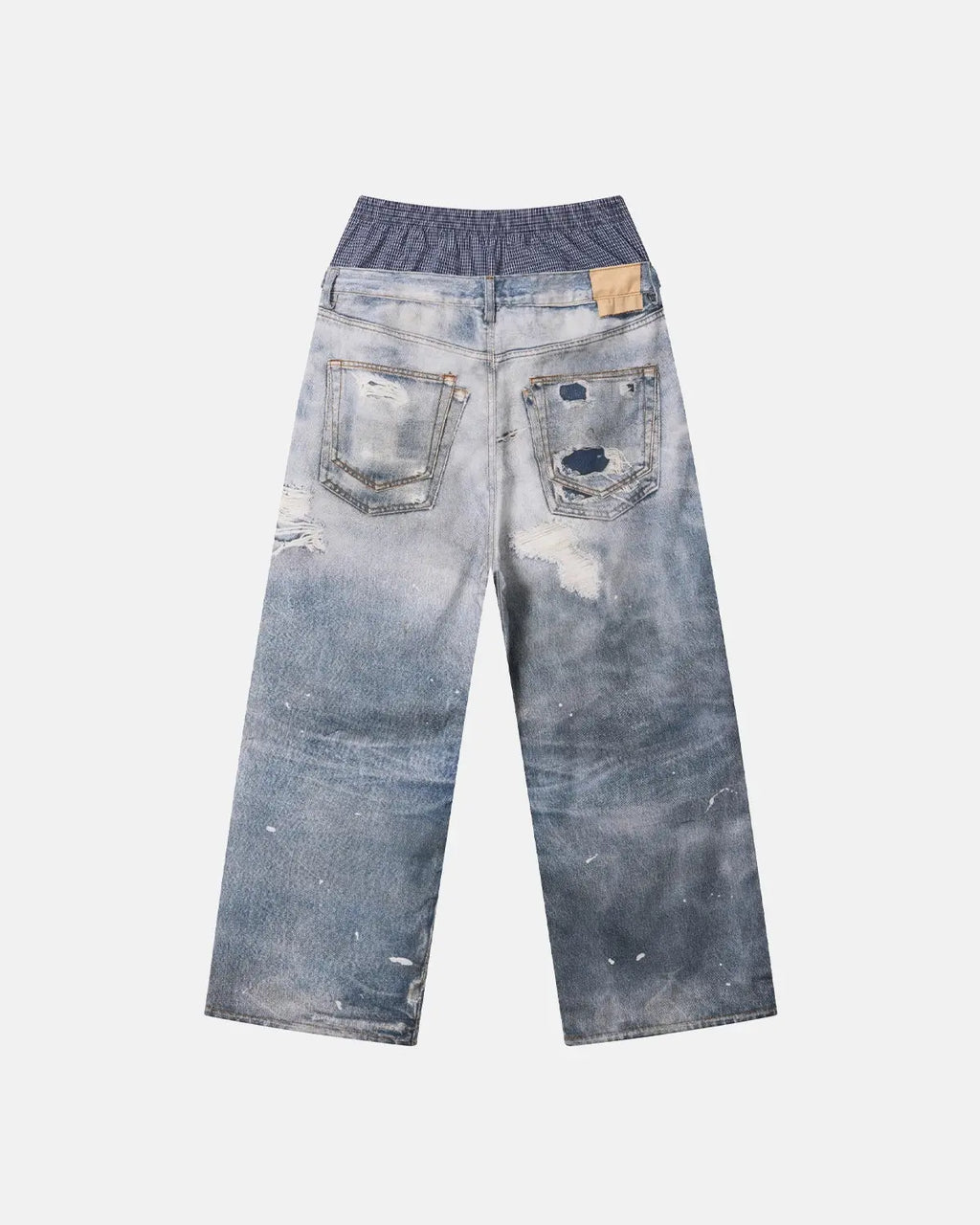 Layered digital print baggy jeans by INFLATION, featuring a relaxed fit and streetwear style with vibrant graphic details.