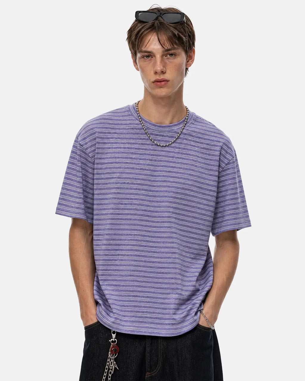 Retro striped boxy T-shirt by INFLATION, featuring bold colorful stripes and a relaxed fit, designed for streetwear style.