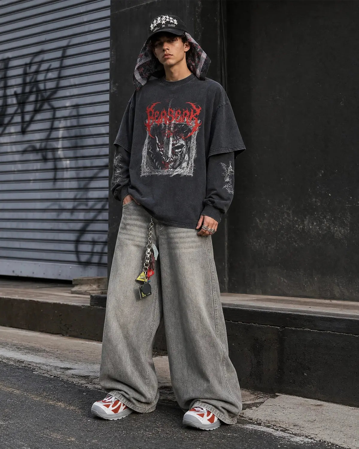 Graphic distressed acid wash layered T-shirt by INFLATION, featuring a trendy streetwear style with a faded, rugged design.
