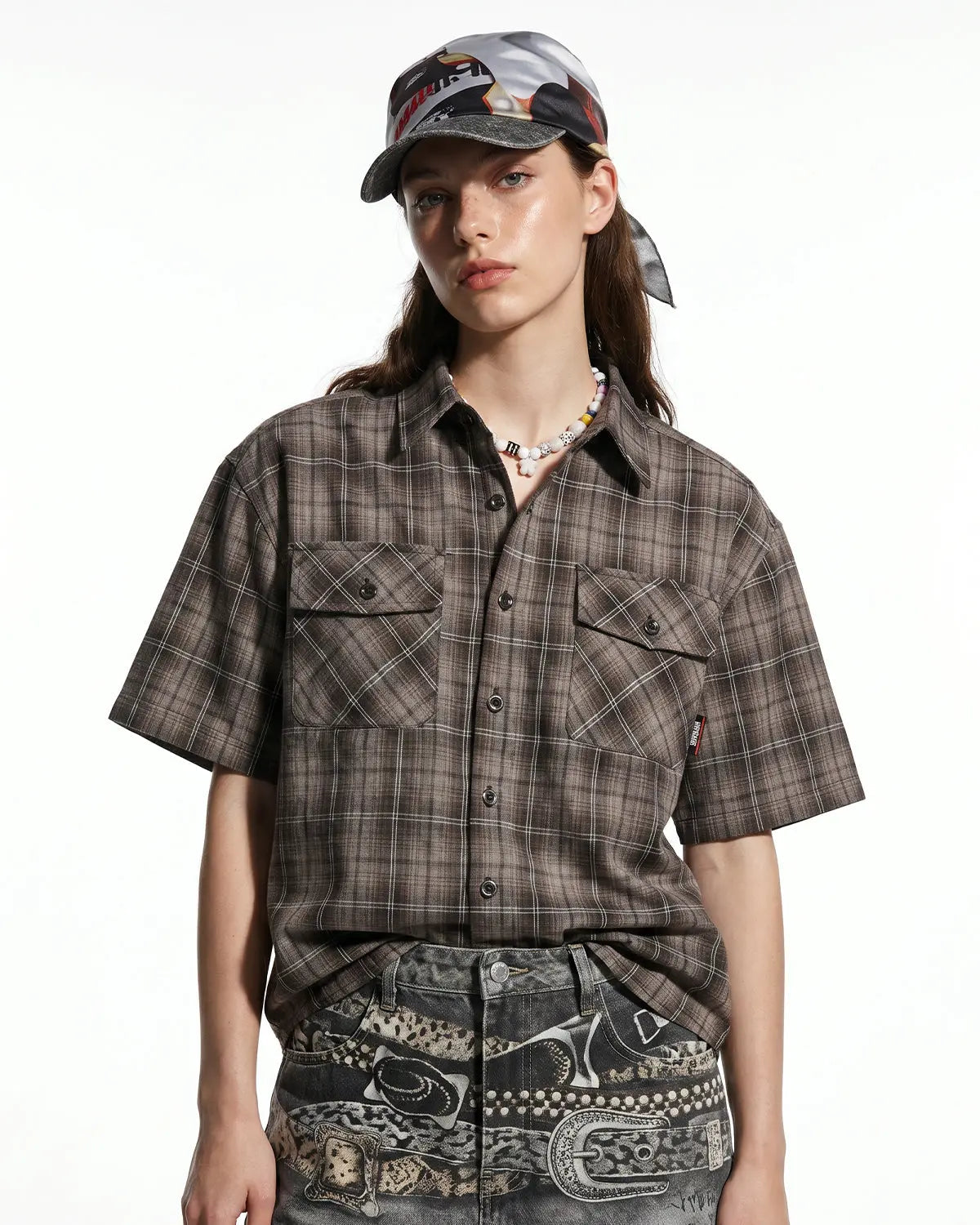 Inflation Streetwear plaid script embroidered shirt with classic collar and button-front, featuring bold embroidered logo and plaid pattern.