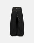 Inflation Buttons Up Raw Baggy Jeans showing relaxed fit, button details, and raw denim texture on the streetwear style jeans.