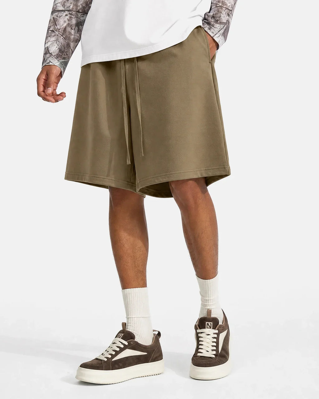 Heavyweight black drawstring sweat shorts by INFLATION, featuring a relaxed fit and casual streetwear style.