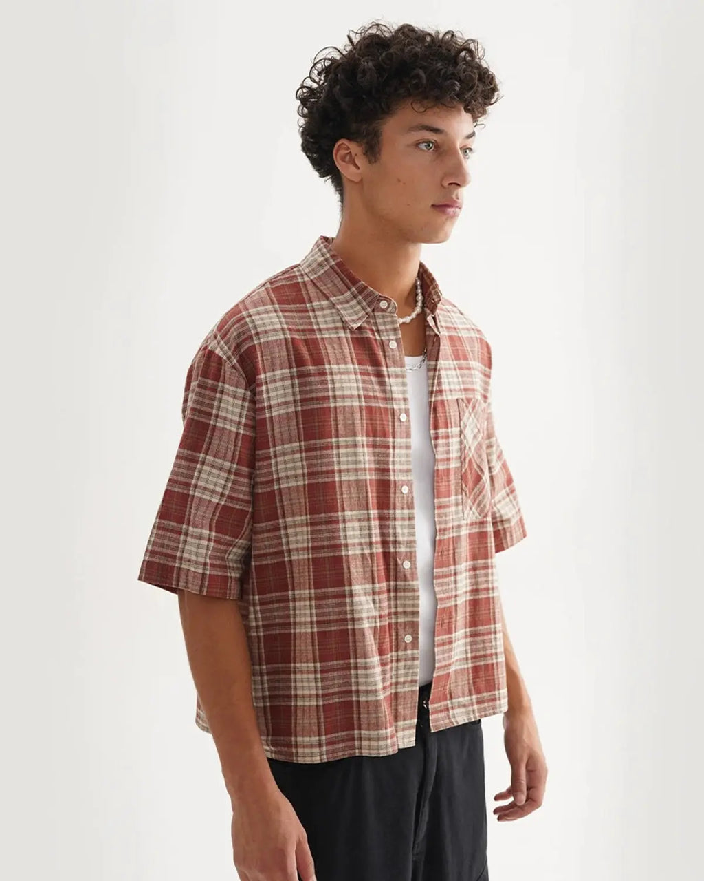 Inflation Streetwear boxy fit plaid shirt with bold pattern, featuring a relaxed, oversized design and button-down front.
