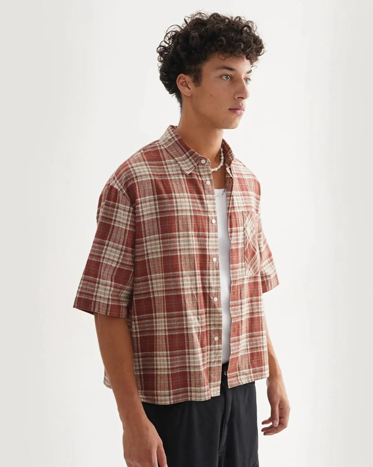 Inflation Streetwear boxy fit plaid shirt with bold pattern, featuring a relaxed, oversized design and button-down front.