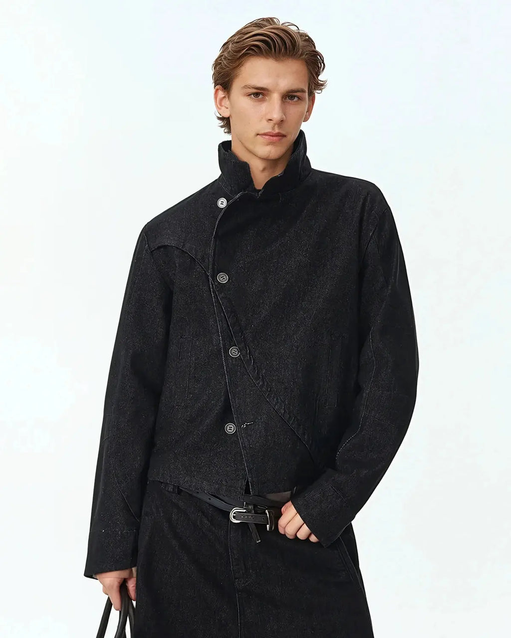 Inflation Streetwear cropped asymmetric button denim jacket with distressed details and stylish fit, front view.