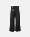 Asymmetric buckle raw baggy jeans by INFLATION featuring a loose fit, distressed denim, and unique asymmetric belt detail.
