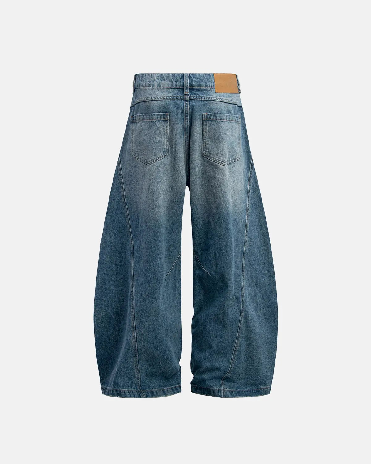 Distressed ripped baggy jeans by INFLATION featuring a relaxed fit and frayed holes, casual streetwear pants.