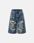 Inflation Heavy Washed Distressed Baggy Jorts, denim pants with frayed edges and a relaxed fit, styled for streetwear fashion.
