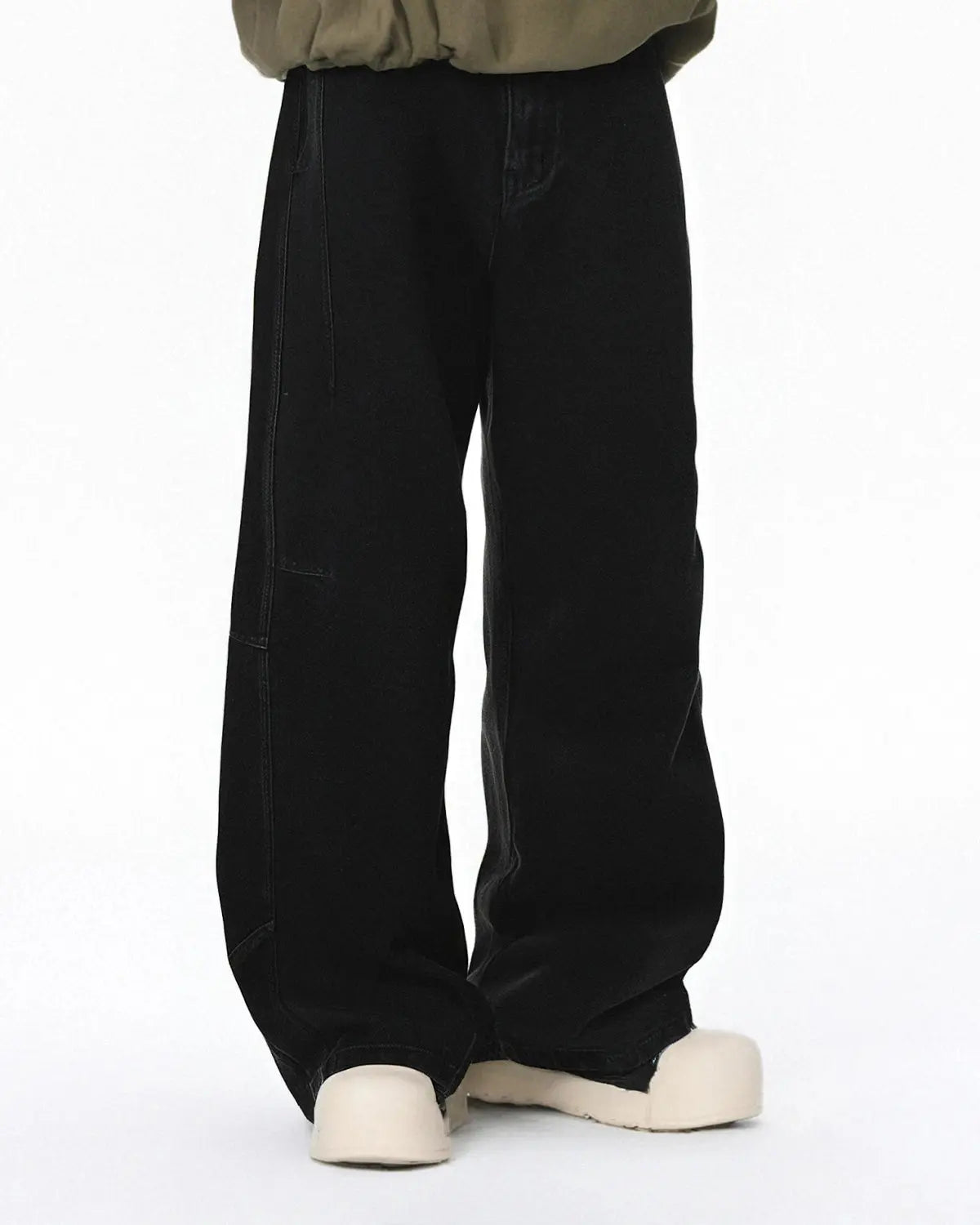 Acid washed black barrel jeans by Inflation Streetwear featuring a relaxed fit and distressed denim look.