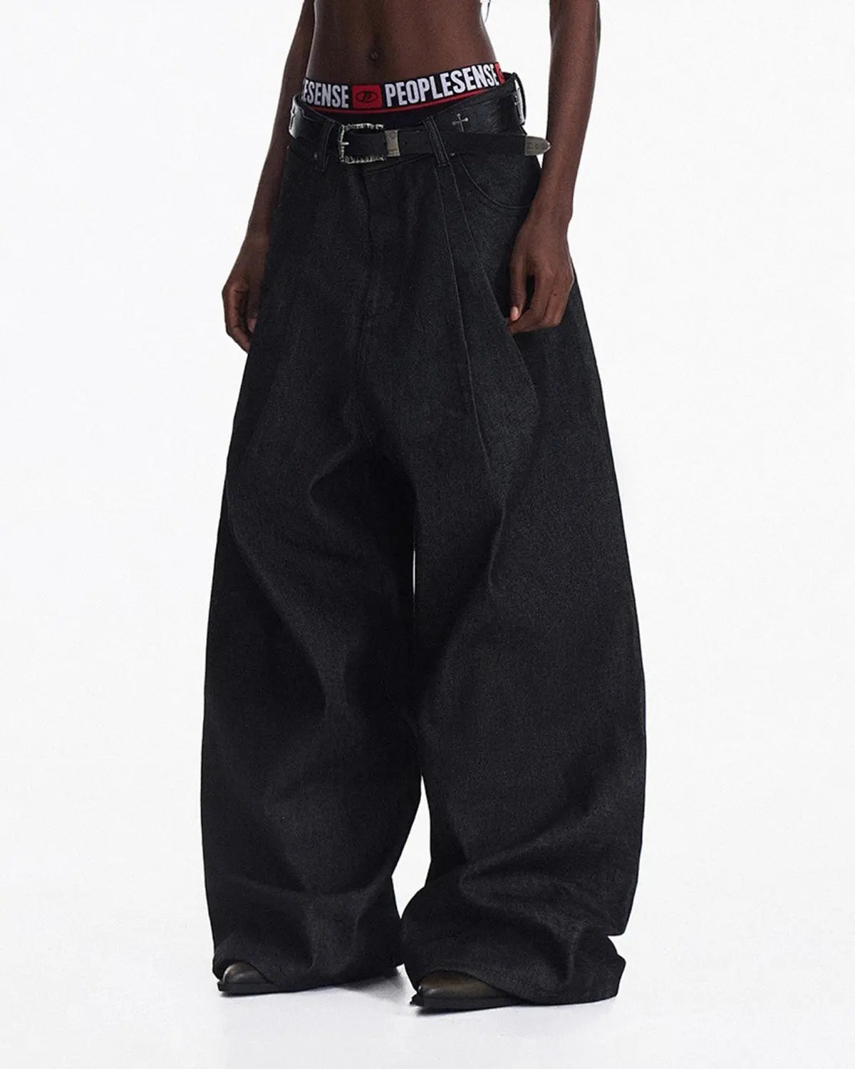 Inflation Streetwear heavyweight baggy raw wide-leg jeans, featuring relaxed fit and raw denim texture, displayed on a hanger.