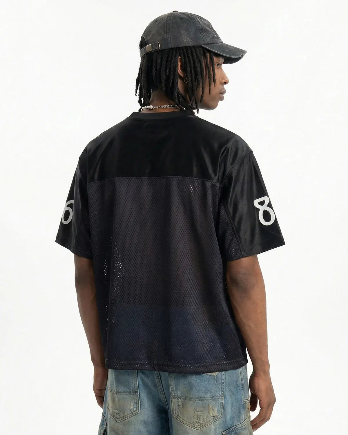 V-Neck Mesh Patchwork Jersey Tee by INFLATION, stylish streetwear top featuring mesh panels and patchwork design.