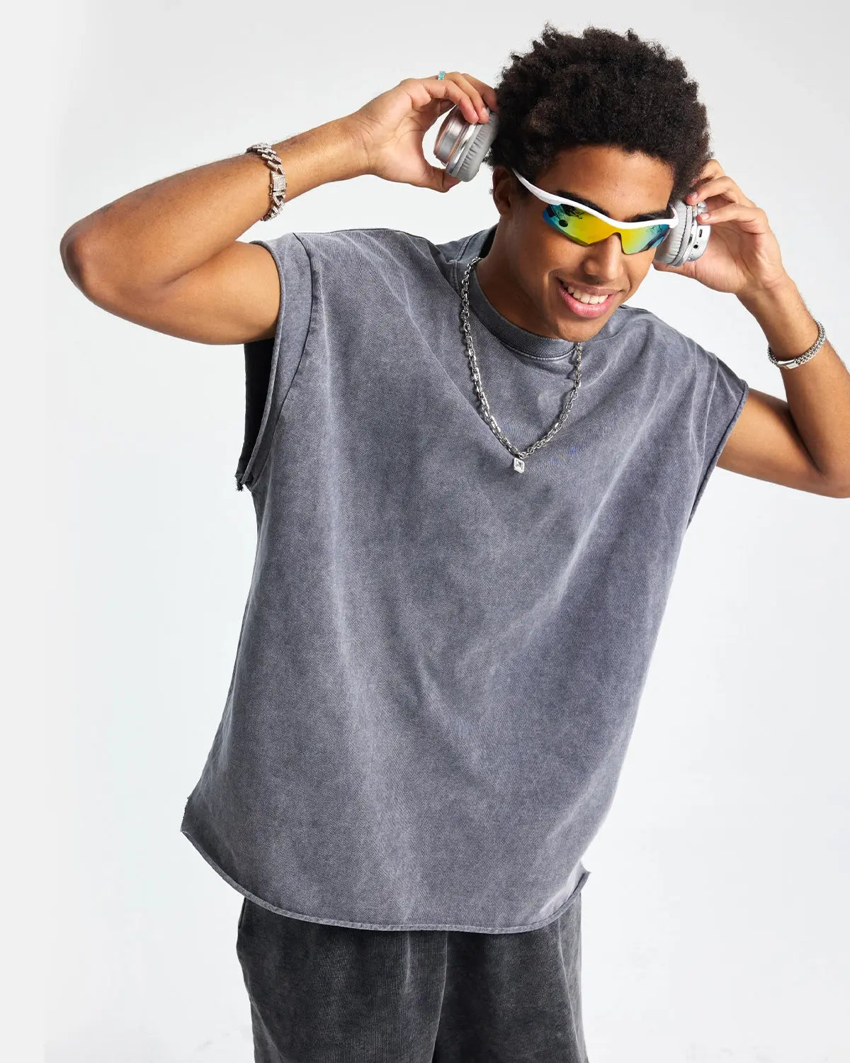 Distressed wash tank top from Inflation Streetwear featuring a relaxed fit and vintage-style fabric, displayed on a plain background.