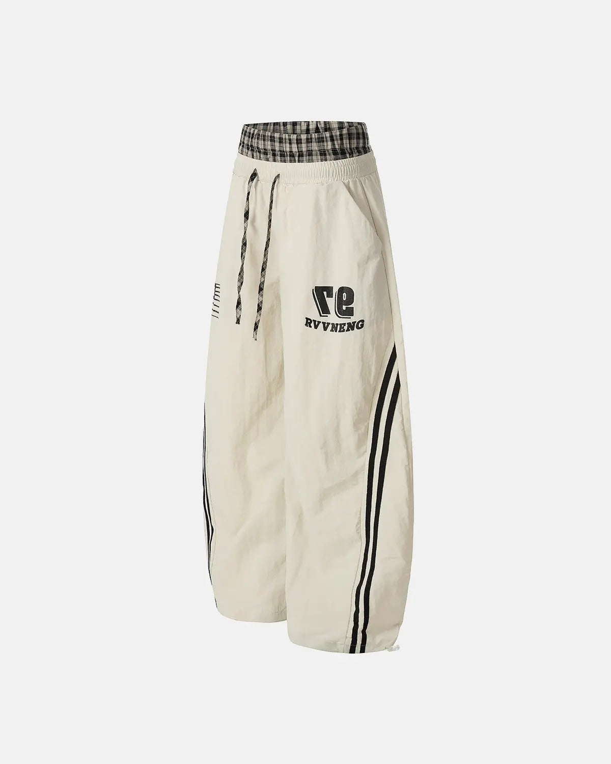 Inflation Streetwear plaid double waist baggy track pants showing a relaxed fit with a plaid pattern and elastic waistband.