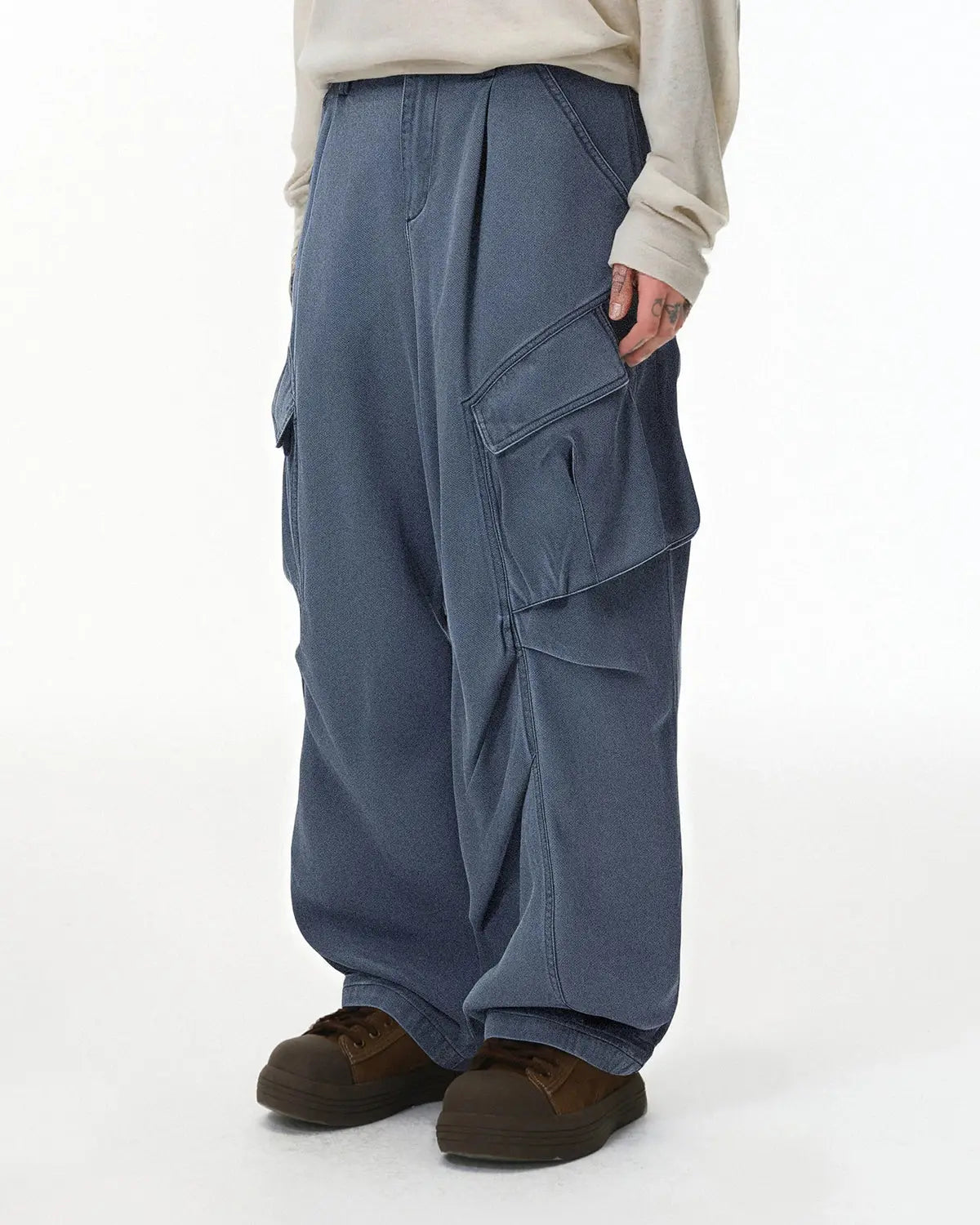 Inflation Streetwear Baggy Cargo Pants with multiple pockets, featuring a relaxed fit and casual streetwear style.