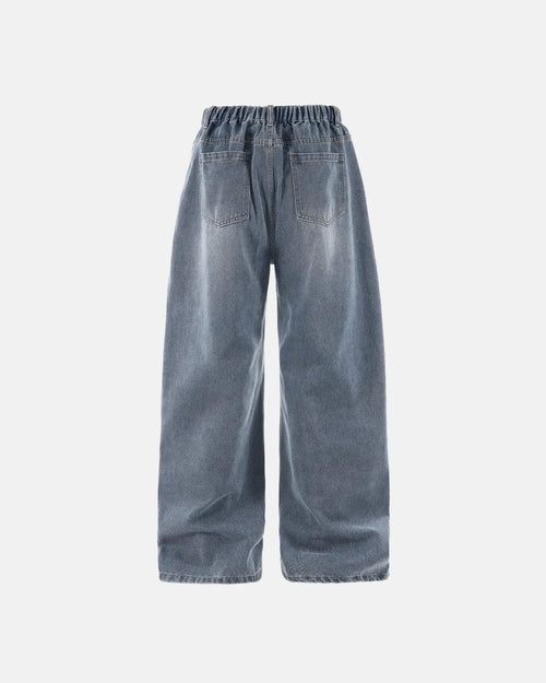 Acid wash detachable bandana baggy jeans by INFLATION featuring a relaxed fit, distressed details, and a removable bandana accessory.
