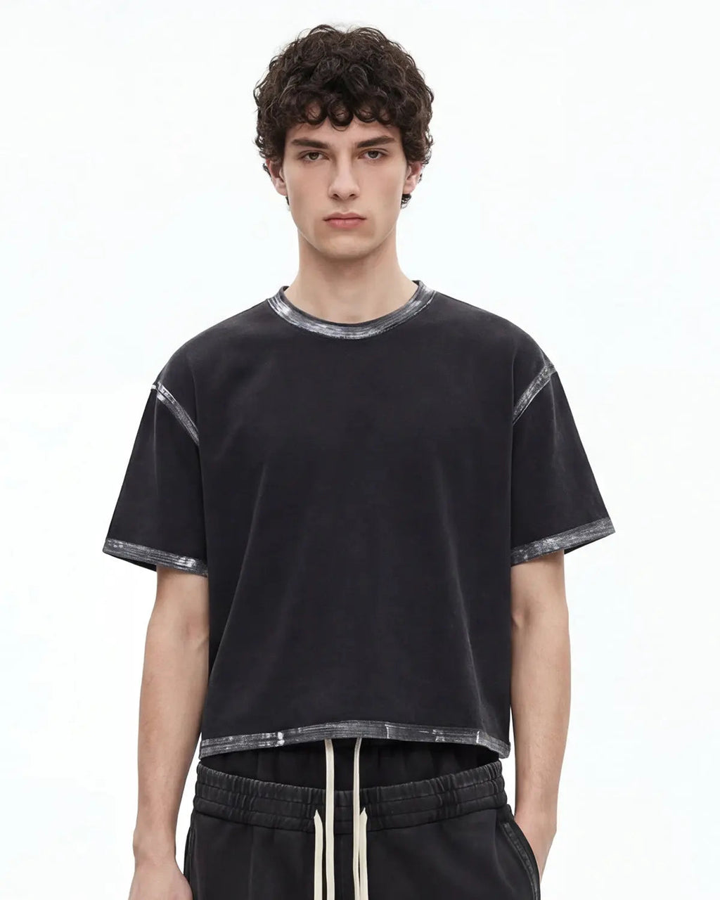 Heavyweight boxy T-shirt from INFLATION's Dirty Wash collection, featuring a relaxed fit and distressed denim-inspired look.