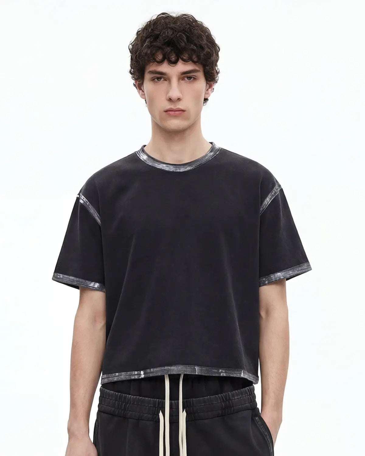 Heavyweight boxy T-shirt from INFLATION's Dirty Wash collection, featuring a relaxed fit and distressed denim-inspired look.