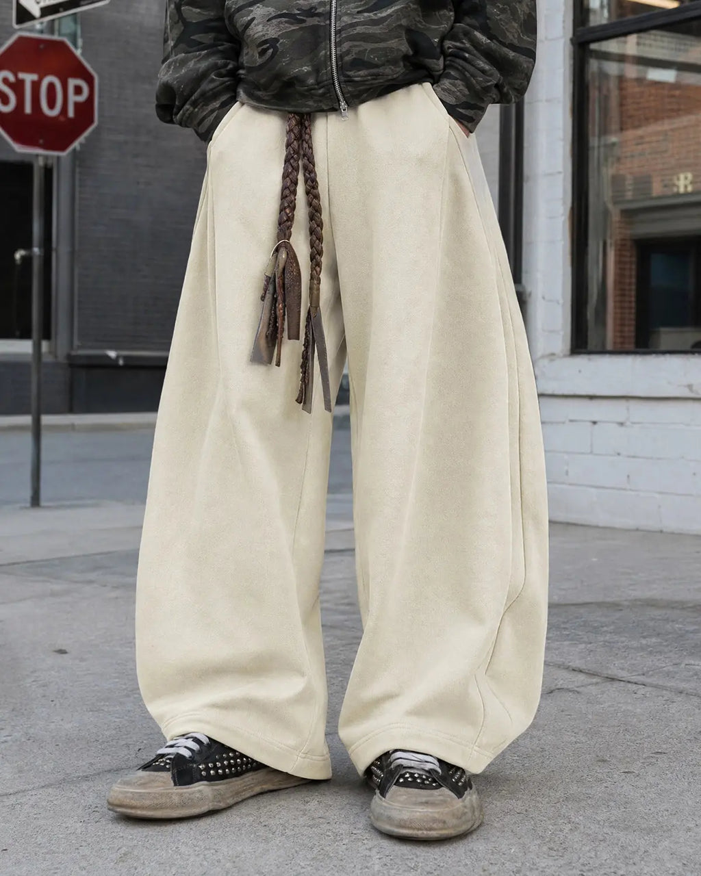 Deconstructed wide leg sweatpants by INFLATION Streetwear featuring relaxed fit and distressed details, shown on a neutral background.