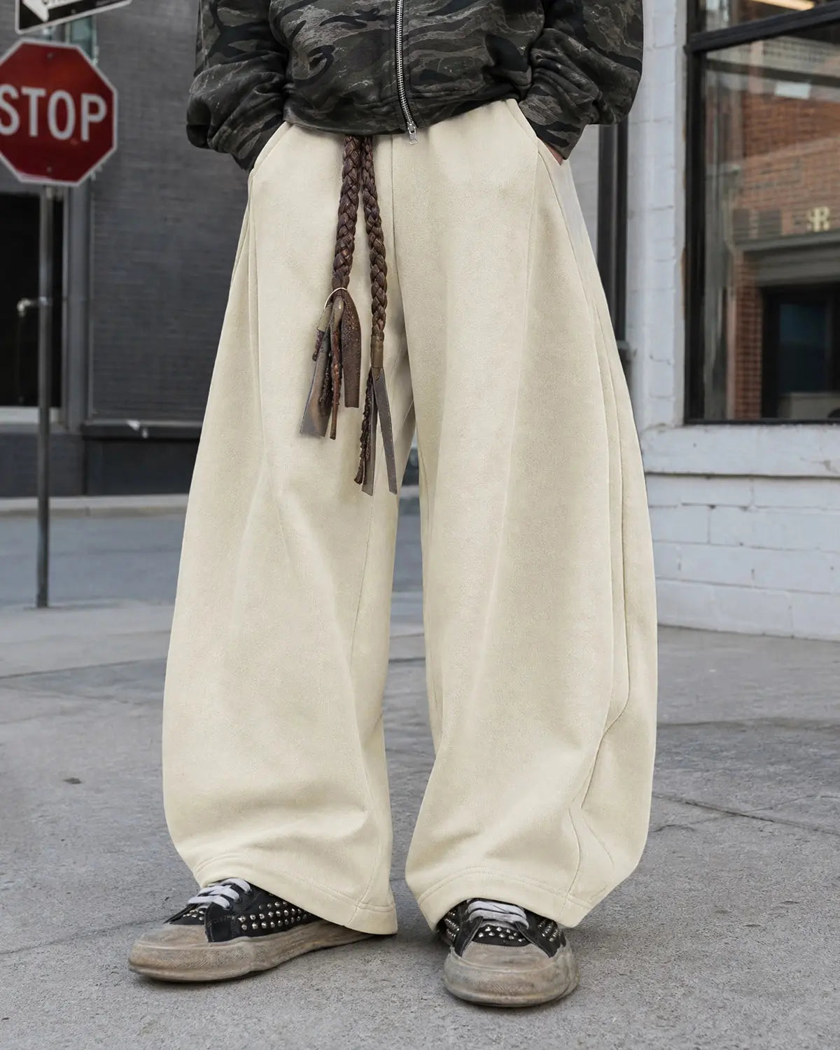 Deconstructed wide leg sweatpants by INFLATION Streetwear featuring relaxed fit and distressed details, shown on a neutral background.