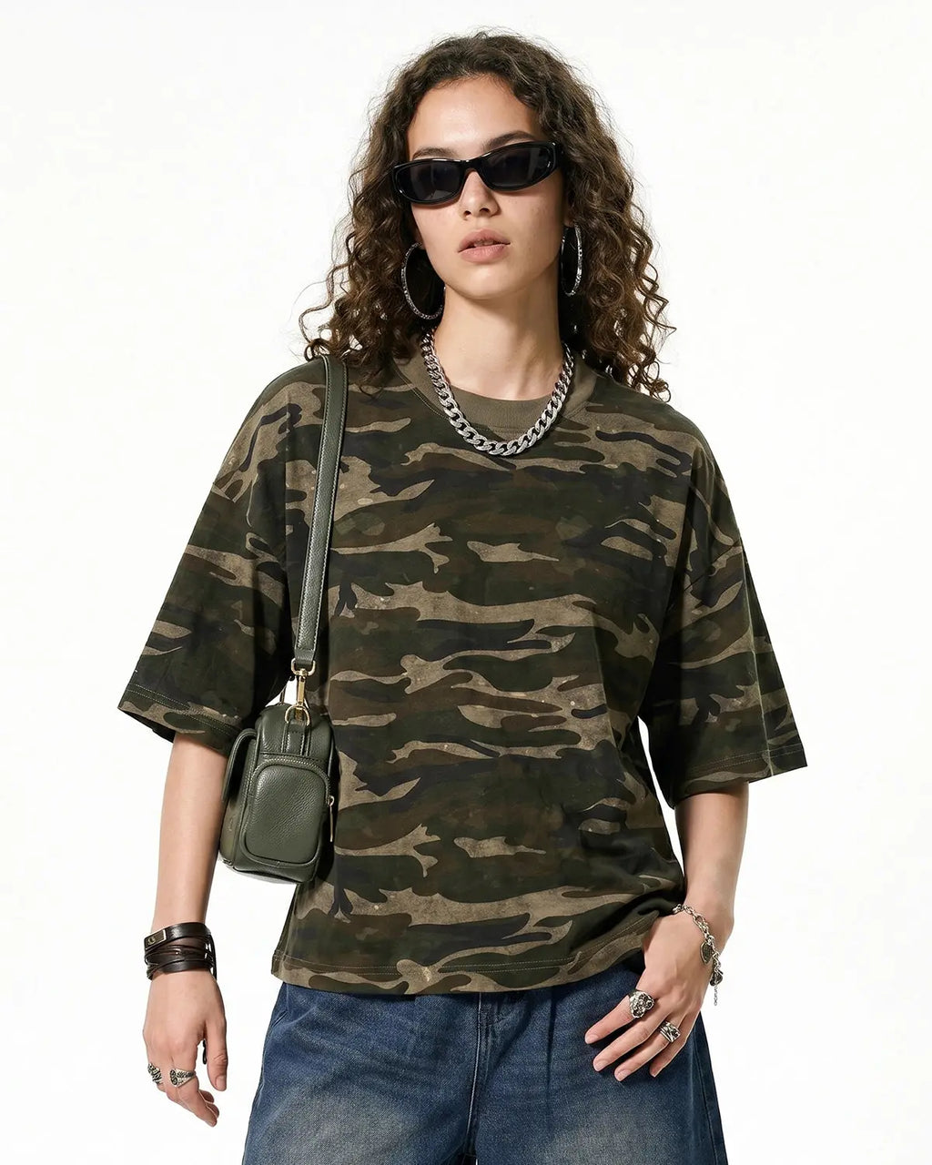 Boxy camo T-shirt by INFLATION featuring a bold camouflage pattern and relaxed fit, casual streetwear style.