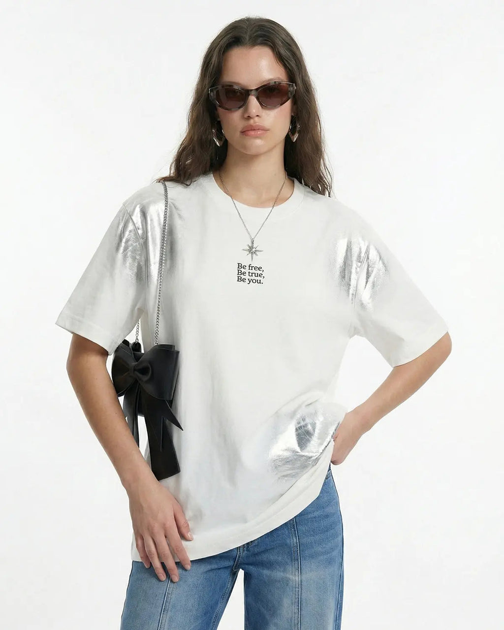 Iridescent shimmer oversized T-shirt by INFLATION, featuring a reflective iridescent fabric and relaxed streetwear fit.