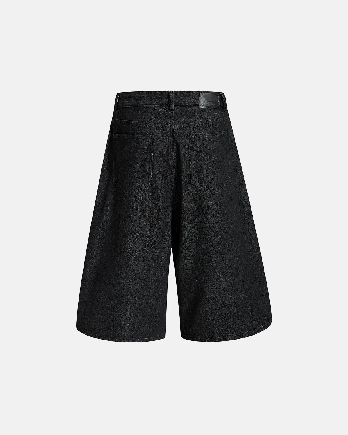 Asymmetric button raw denim jorts by INFLATION featuring distressed details and raw hem, casual streetwear pants for a trendy look.