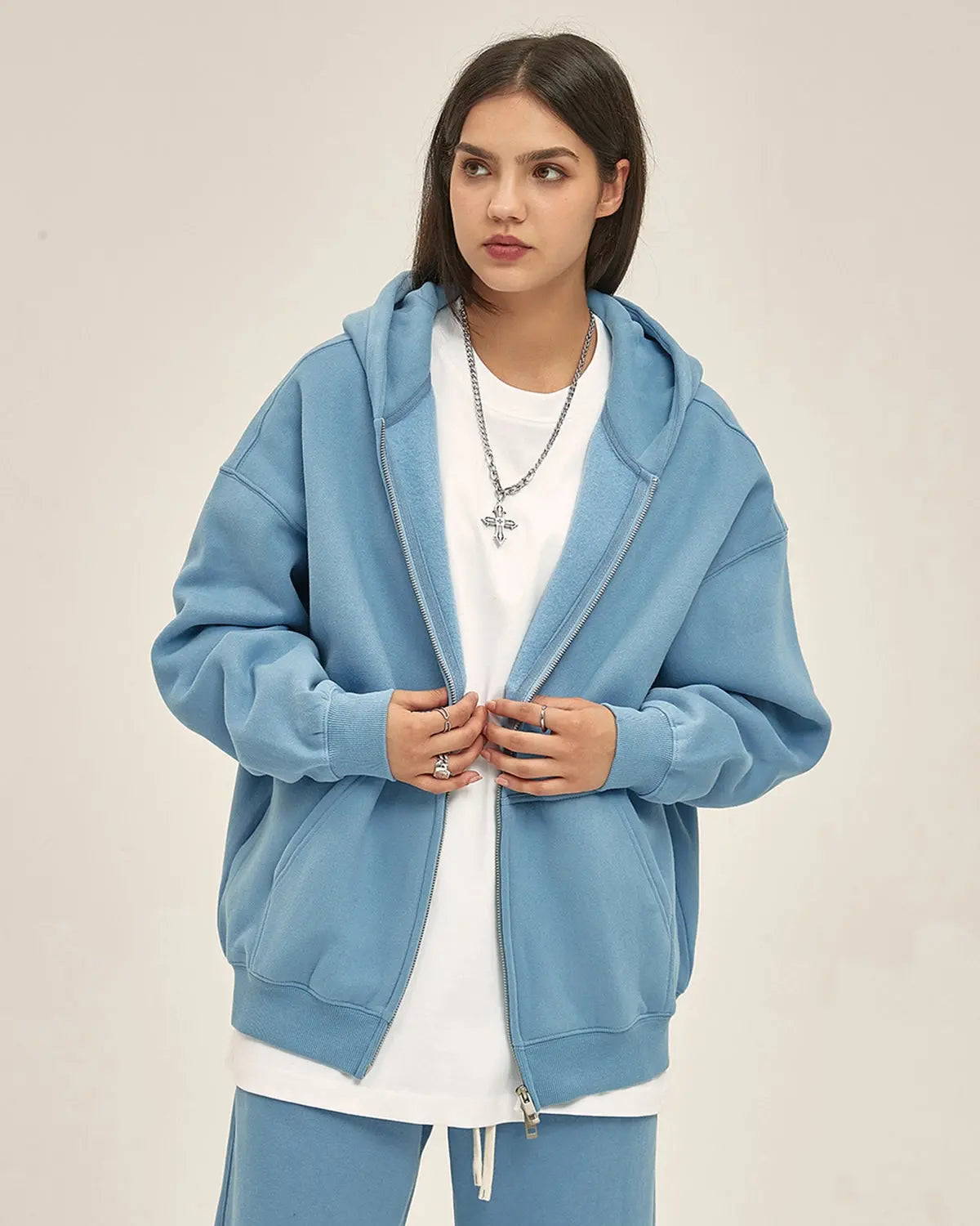 Inflation Streetwear fleece double zip-up hoodie jacket with front pockets and adjustable drawstrings, in a cozy, casual style.