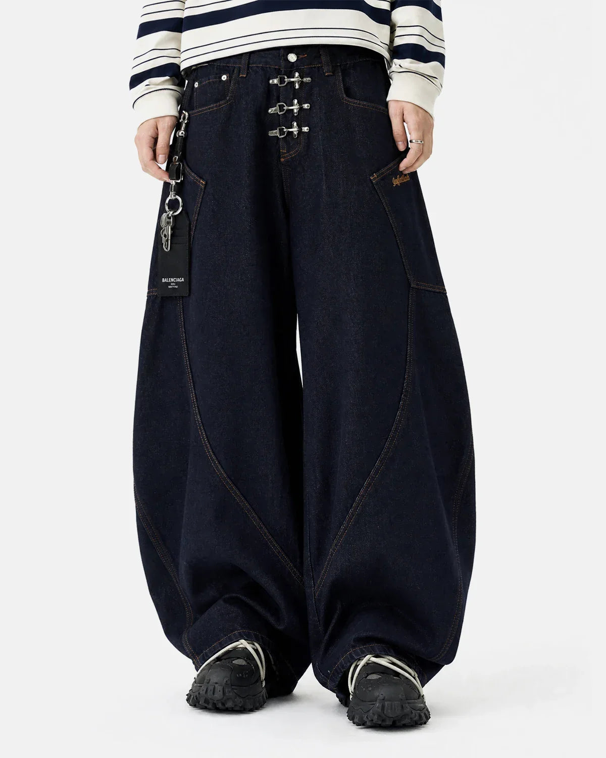 Raw barrel jeans with metal clasp detailing from Inflation Streetwear, featuring classic denim fabric and a relaxed fit.