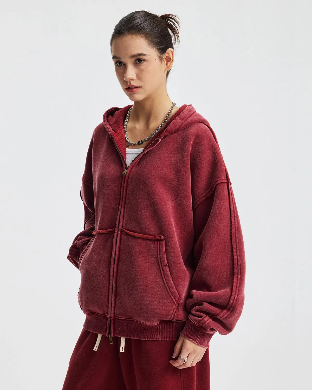 Inflation streetwear distressed acid wash double zip hoodie with front zippers and worn look, casual style, close-up of fabric details.
